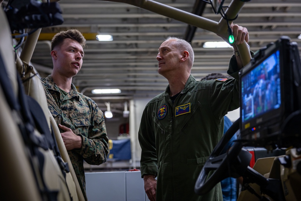 Marines from the 22nd LAAD Brief Commander, ESG 2 on L-MADIS
