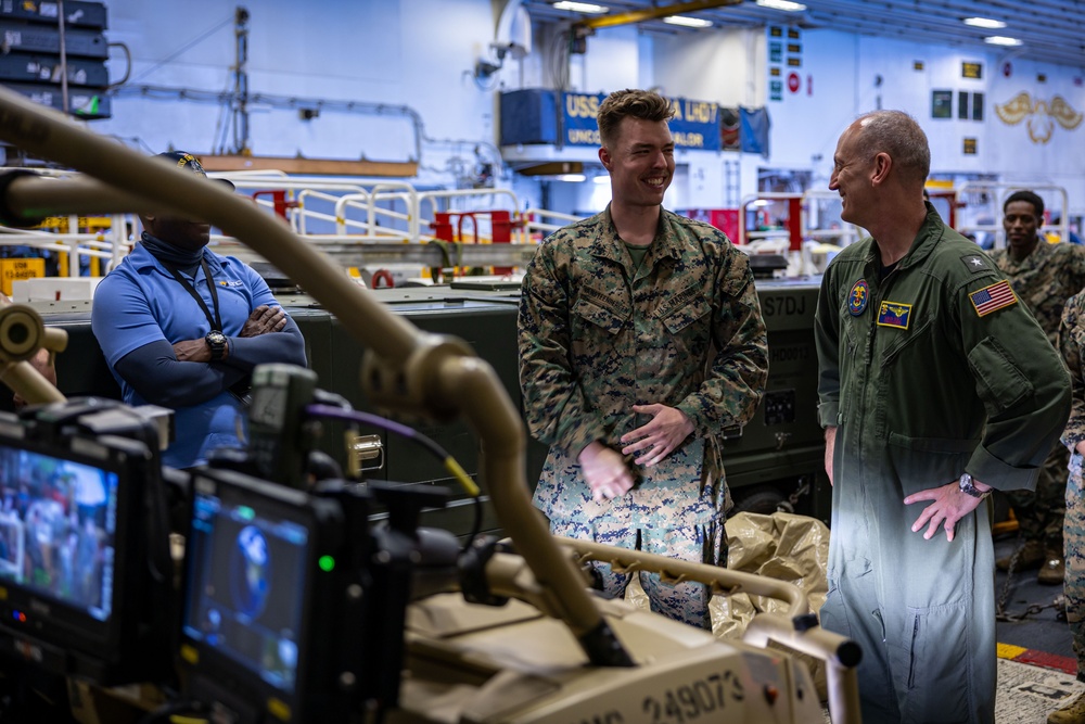 Marines from the 22nd LAAD Brief Commander, ESG 2 on L-MADIS