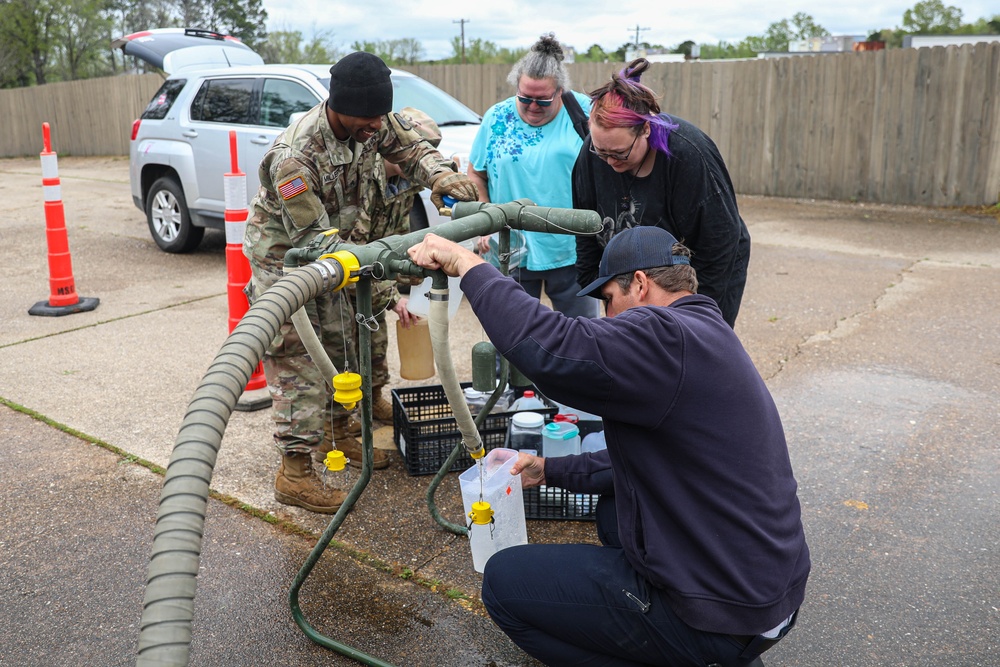 Ark. Guardsmen Deliver Fresh Water After The Storm