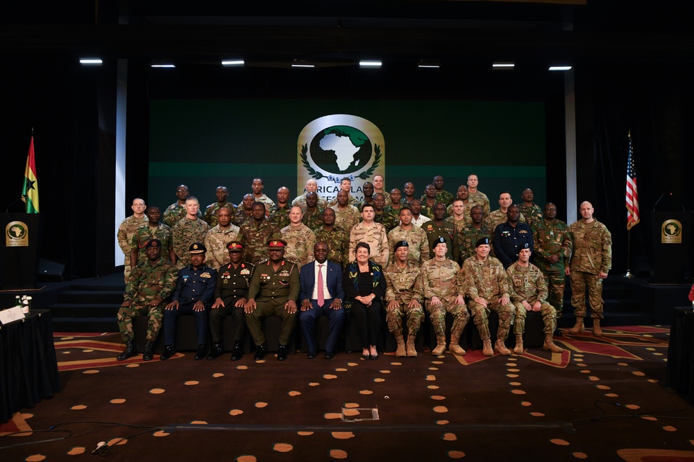 US, Ghana Armed Forces members pose for a group photo during African Land Forces Summit 2025