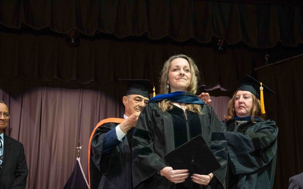 NPS Hall of Fame Alumnus Inspires Graduates During Winter Quarter Commencement