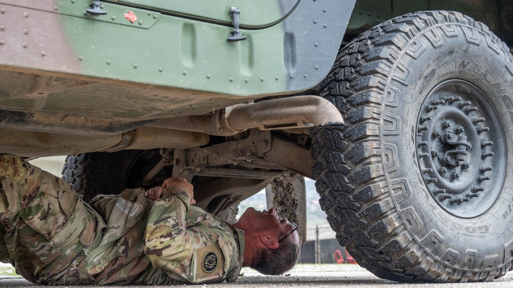 MDARNG member conducts vehicle maintenance, Zenica, BiH