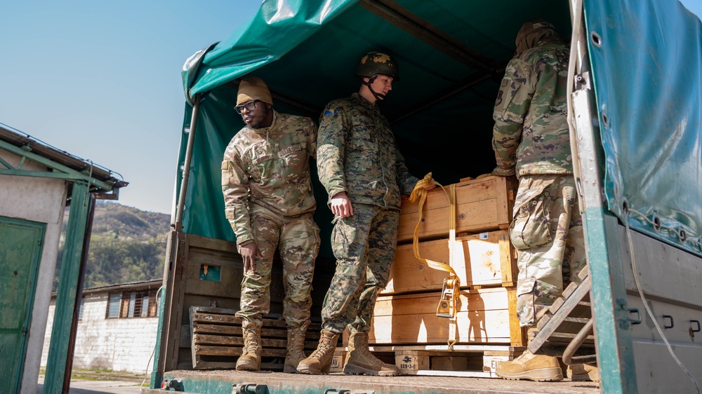 MDNG and AFBiH load vehicles for convoy in Zenica, BiH