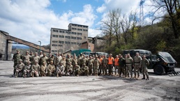 MDNG and AFBiH pose for group photo during convoy operation, Kakanj, BiH