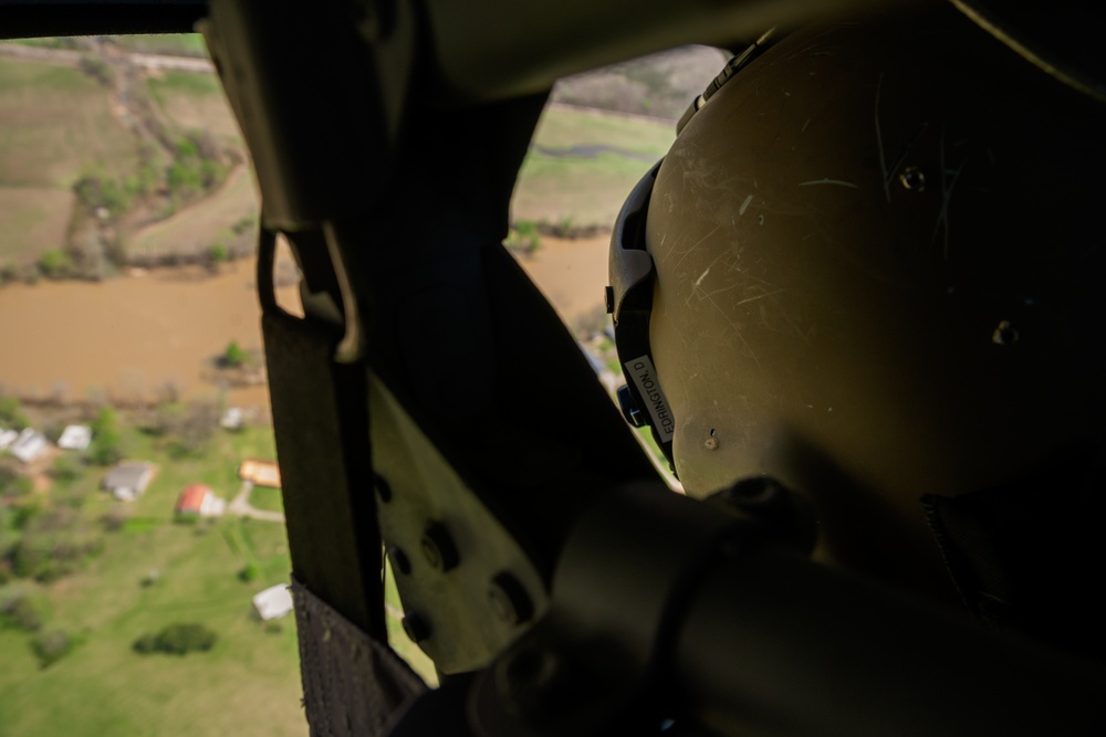 FEMA and Arkansas National Guard patrol disaster area