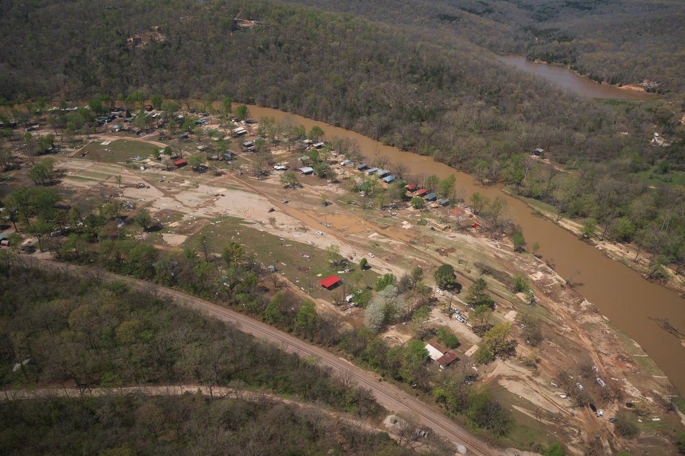 FEMA and Arkansas National Guard patrol disaster area