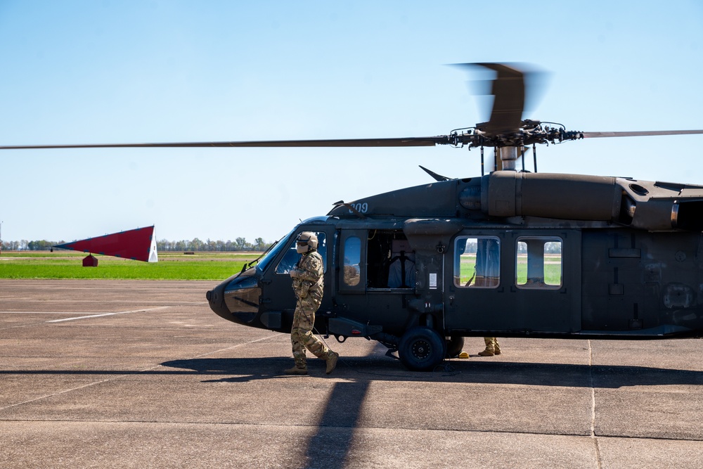 FEMA and Arkansas National Guard patrol disaster area