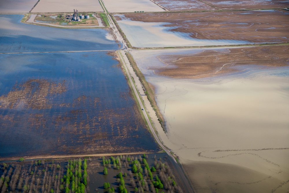 FEMA and Arkansas National Guard patrol disaster area