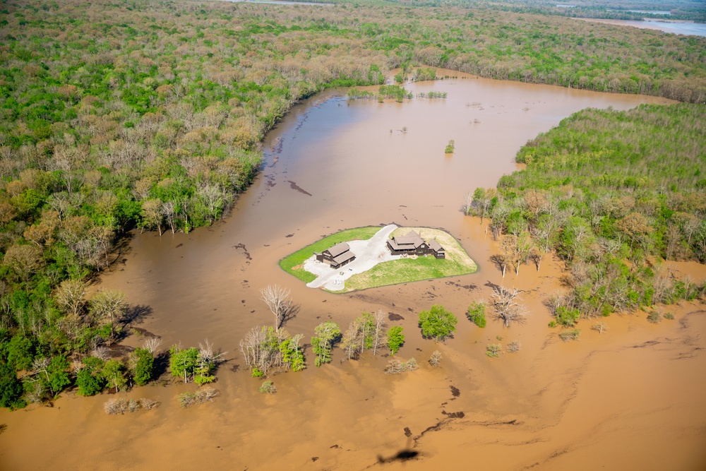 FEMA and Arkansas National Guard patrol disaster area