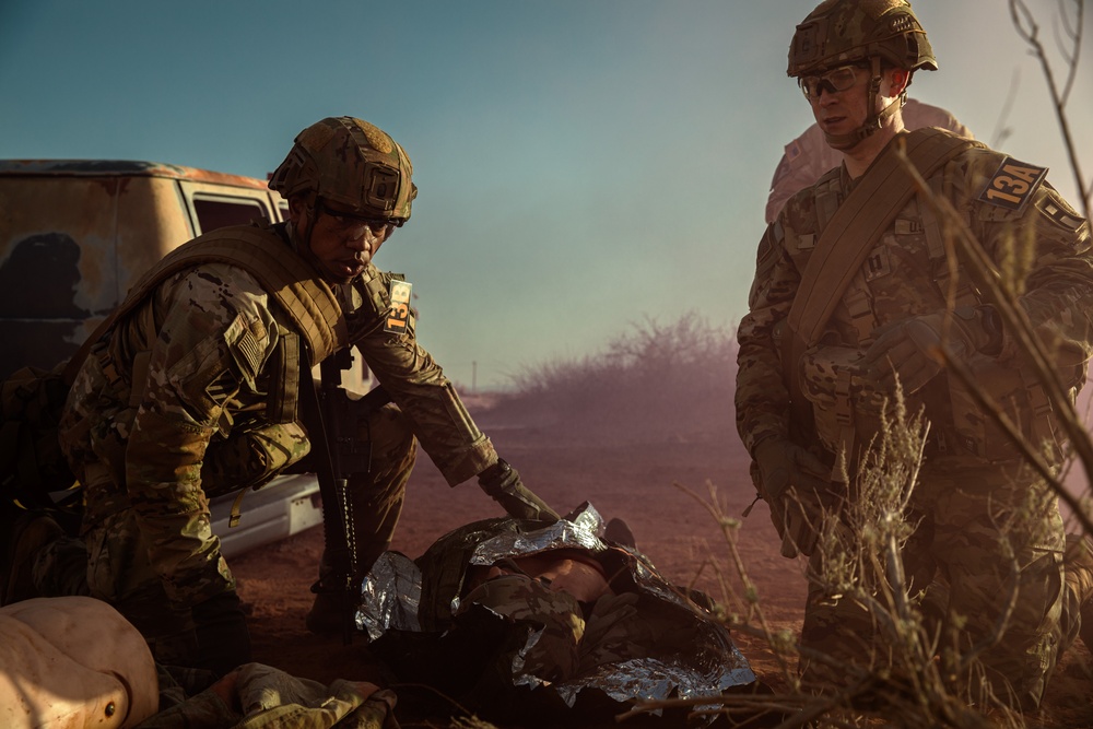 Soldiers compete in a casualty evacuation exercise during the Gen. Omar N. Bradley Best Observer, Coach/Trainer Competition