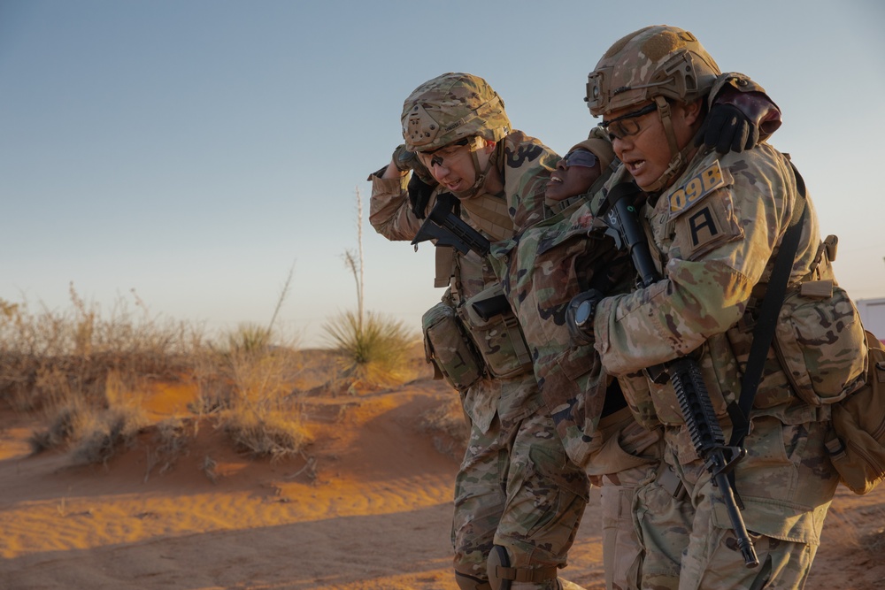 Soldiers compete in a casualty evacuation exercise during the Gen. Omar N. Bradley Best Observer, Coach/Trainer Competition