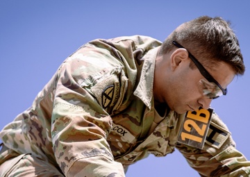 Soldiers compete in an obstacle course during the Gen. Omar N. Bradley Best Observer, Coach/Trainer Competition