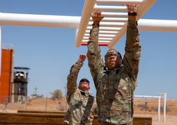 Soldiers compete in an obstacle course during the Gen. Omar N. Bradley Best Observer, Coach/Trainer Competition