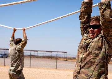 Soldiers compete in an obstacle course during the Gen. Omar N. Bradley Best Observer, Coach/Trainer Competition