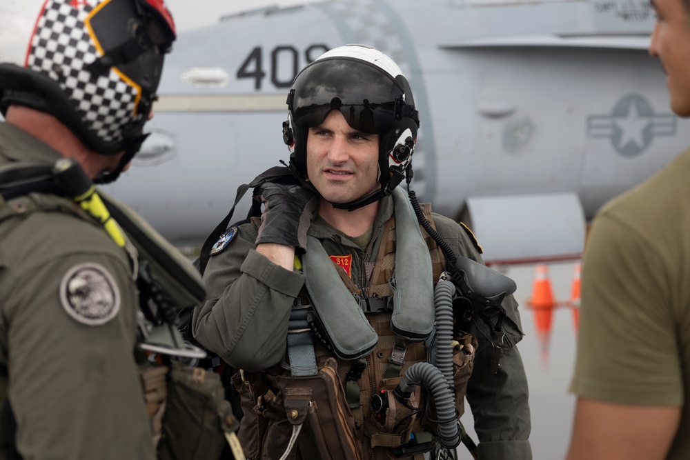 U.S. Marines and Panamanian civilian contractors launch F/A-18 Hornets