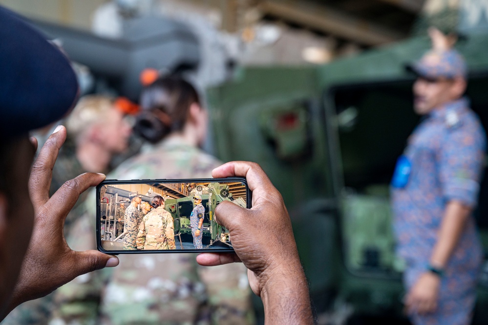 U.S and Indian service members tour the USS Comstock during Tiger Triumph 2025