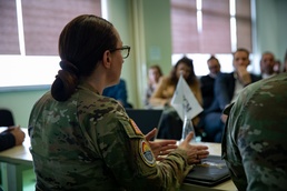 U.S. Soldiers visit the Public International Business College Mitrovica