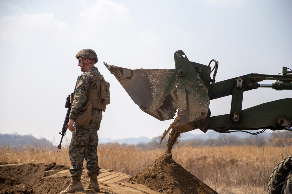 U.S. Marines and Sailors conduct force on force exercise in South Korea