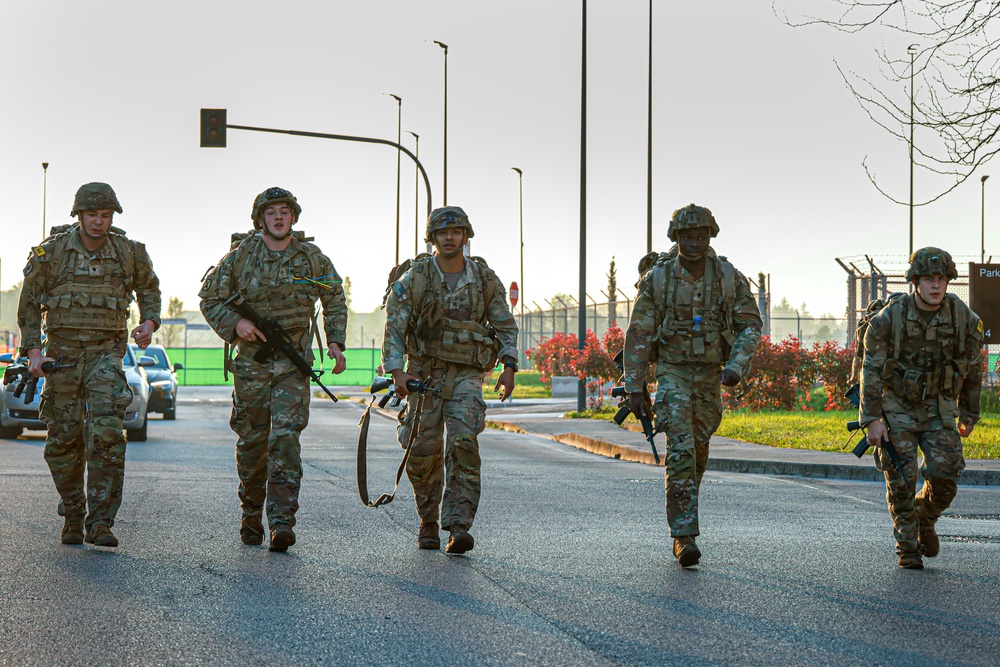 Soldiers conduct 12-mile ruck march at Best Squad Competition in Italy