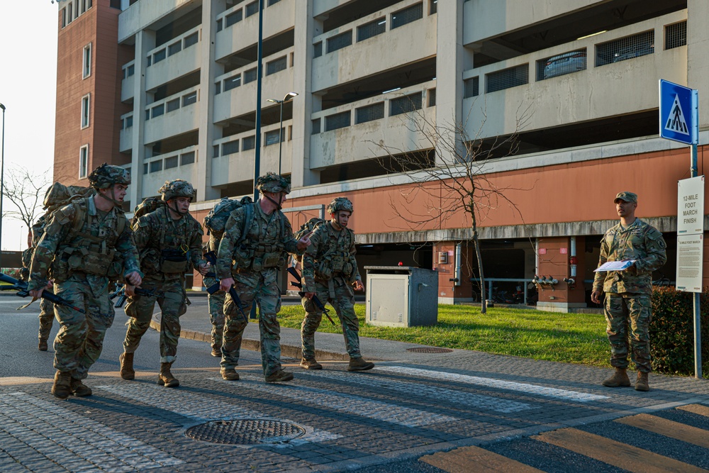 Soldiers conduct 12-mile ruck march at Best Squad Competition in Italy