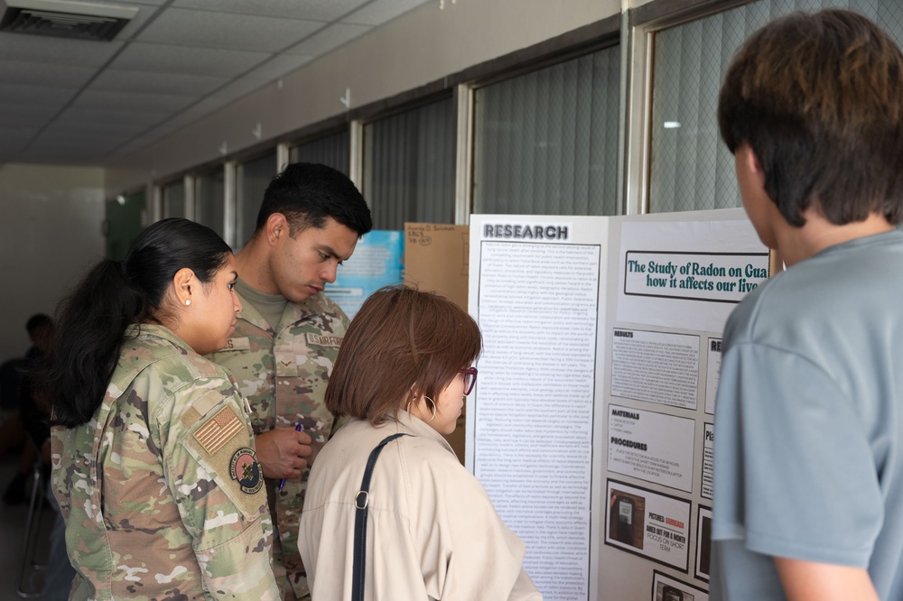 36th MDG Airmen volunteer as judges in the Guam Island Wide Science Fair