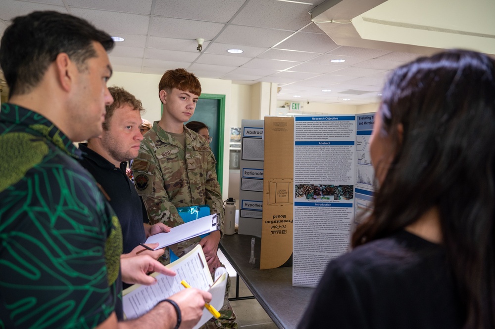 36th MDG Airmen volunteer as judges in the Guam Island Wide Science Fair