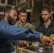 Sailors conduct training in USS Iwo Jima's PR shop