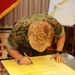 Col. Karin Fitzgerald signs the Child Abuse Prevention Month proclamation