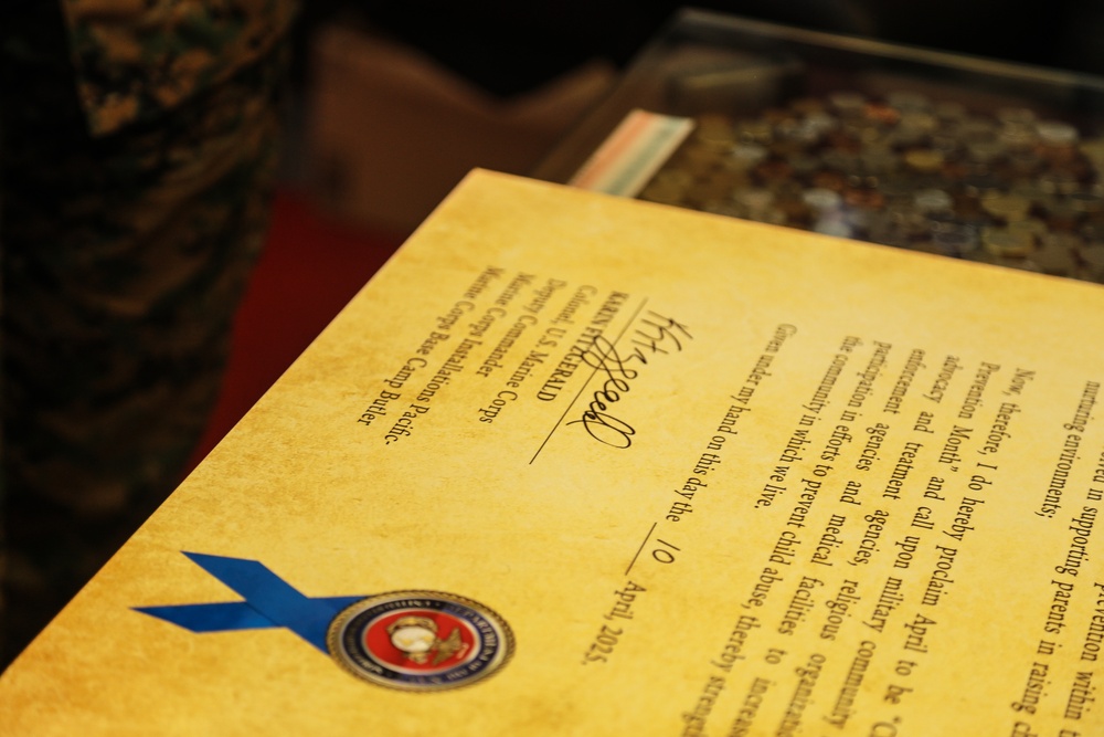 Col. Karin Fitzgerald signs the Child Abuse Prevention Month proclamation