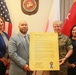 Col. Karin Fitzgerald signs the Child Abuse Prevention Month proclamation