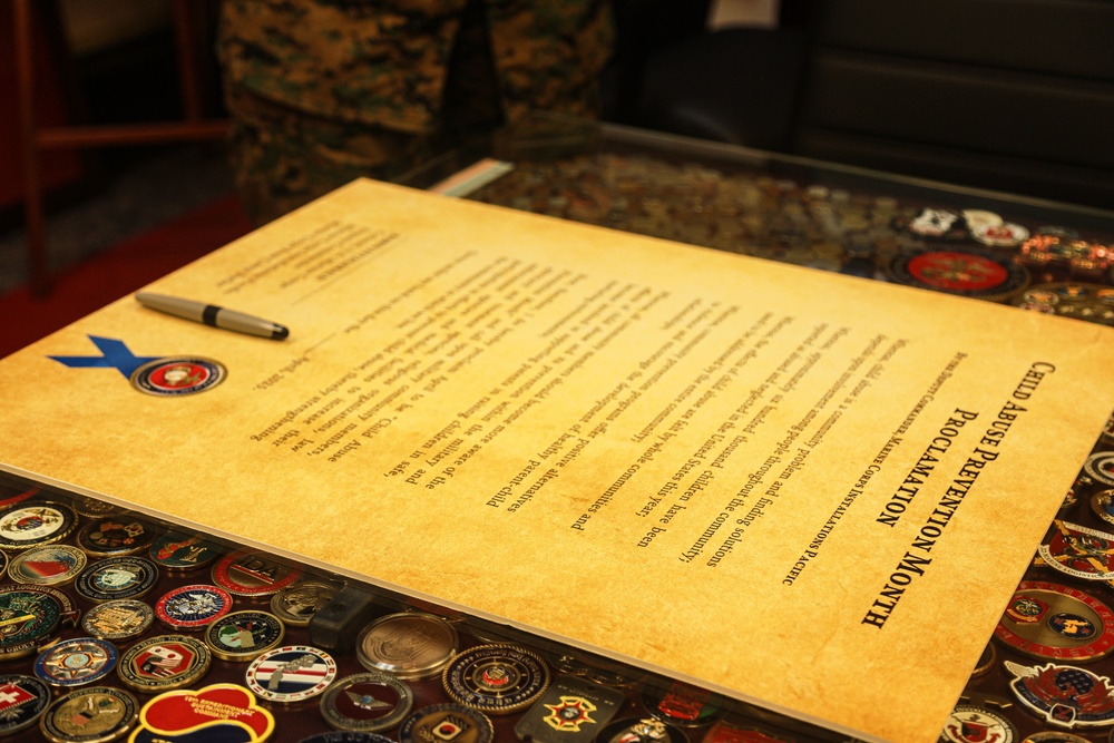 Col. Karin Fitzgerald signs the Child Abuse Prevention Month proclamation