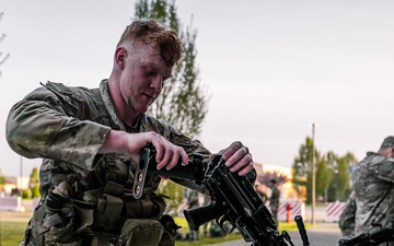 Soldiers execute weapons lane at Best Squad competition in Italy