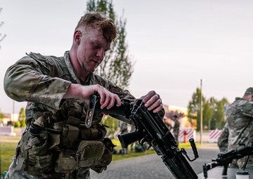 Soldiers execute weapons lane at Best Squad competition in Italy