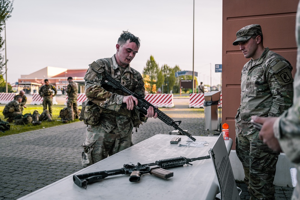 Soldiers execute weapons lane at Best Squad competition in Italy