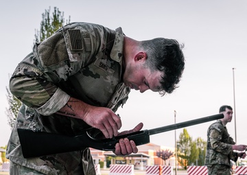 Soldiers execute weapons lane at Best Squad competition in Italy