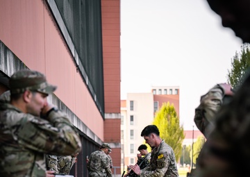 Soldiers execute weapons lane at Best Squad competition in Italy