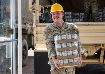 The 230th Engineer Battalion transports 240 cases of essential supplies in Obion County Tennessee
