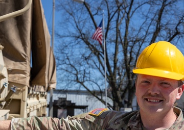 The 230th Engineer Battalion transports 240 cases of essential supplies in Obion County Tennessee