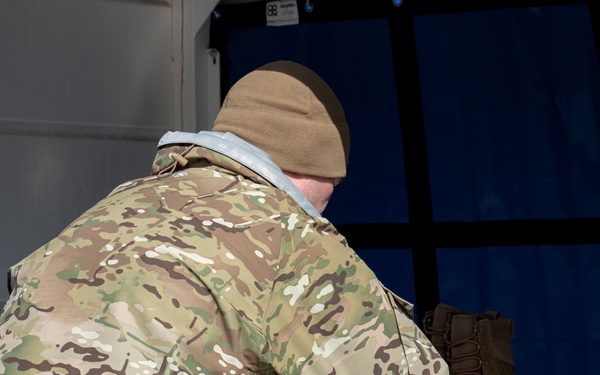 Military members provide honors for guardian flight in Kodiak, Alaska