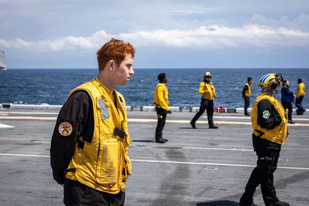 USS Iwo Jima conducts a FOD walkdown underway