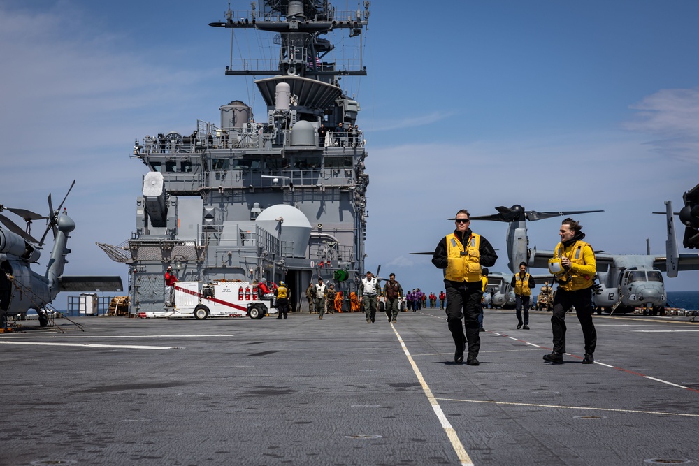 USS Iwo Jima conducts a FOD walkdown underway