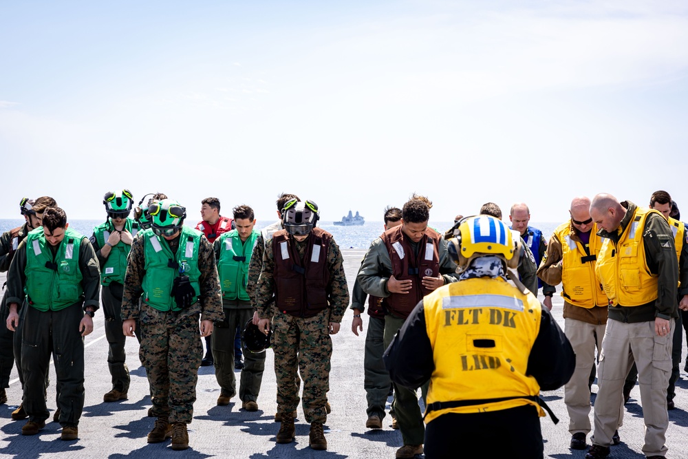 USS Iwo Jima conducts a FOD walkdown underway
