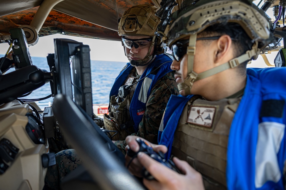 USS Iwo Jima conducts a FOD walkdown underway