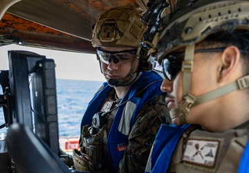 USS Iwo Jima conducts a FOD walkdown underway