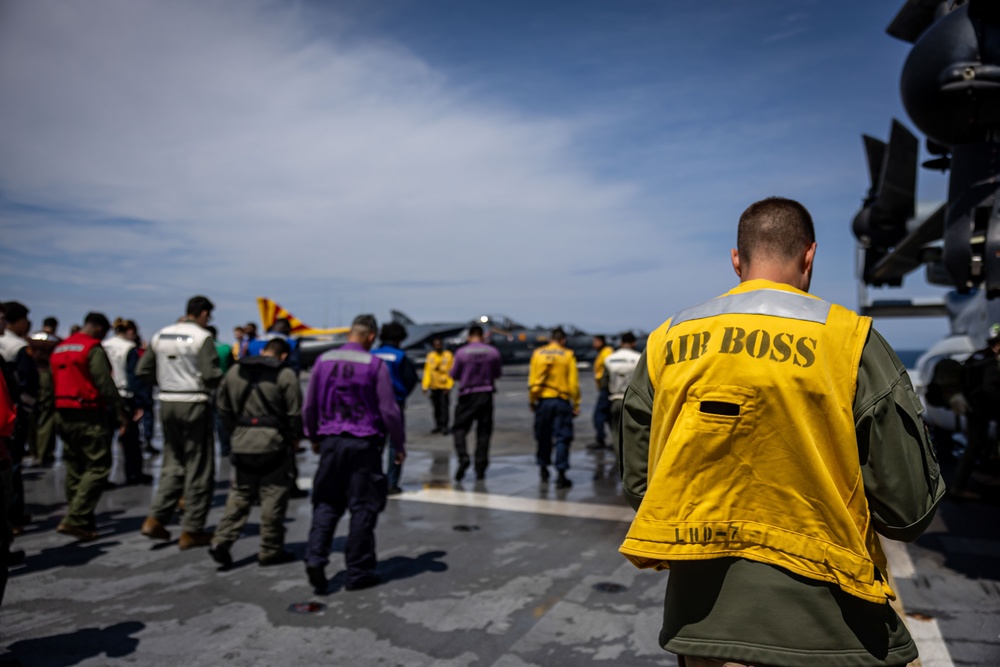USS Iwo Jima conducts a FOD walkdown underway