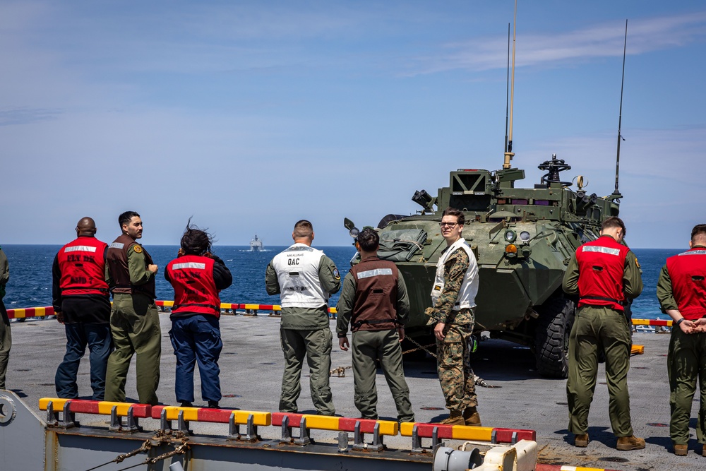 USS Iwo Jima conducts a FOD walkdown underway