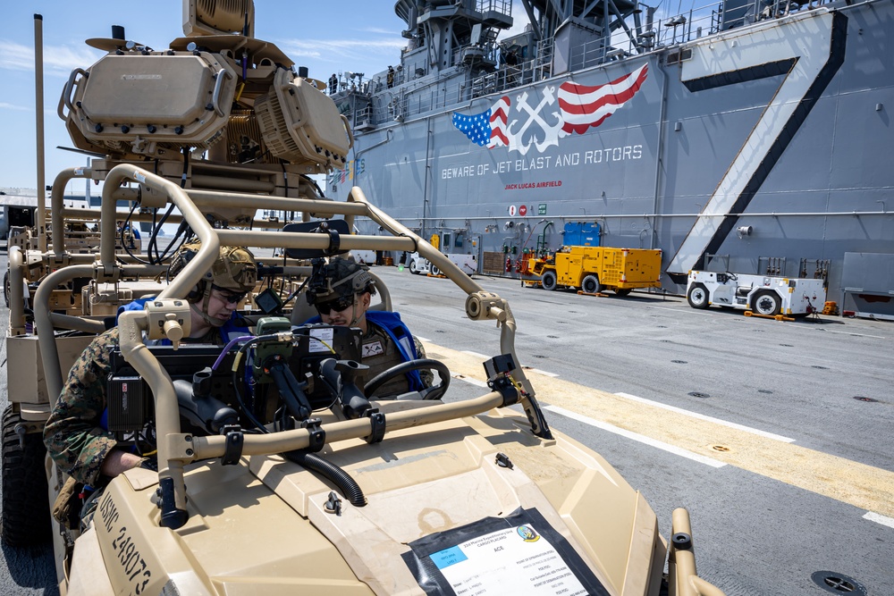 USS Iwo Jima conducts a FOD walkdown underway