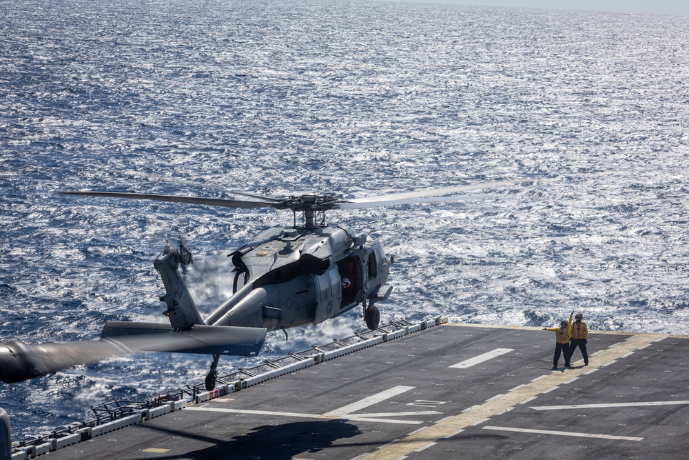 USS Iwo Jima conducts a FOD walkdown underway