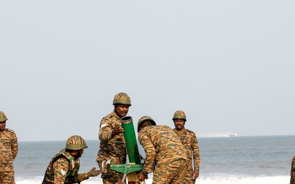 Indian Army Soldiers conduct mortar simulation during an amphibious landing drill