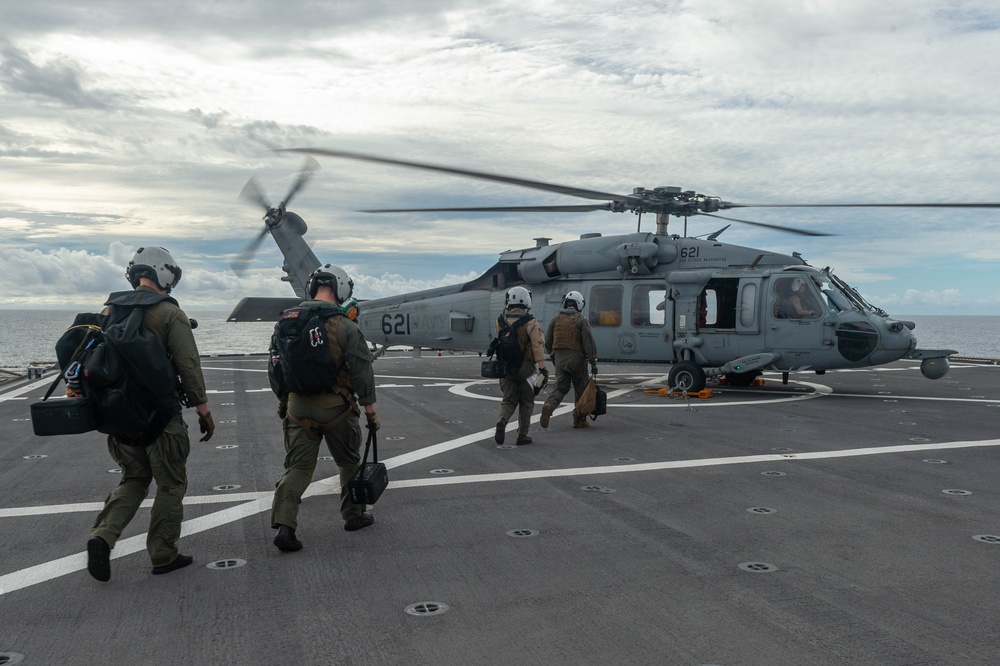 USS Blue Ridge (LCC 19) conducts flight operations in the Coral Sea